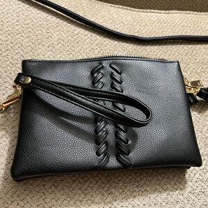 Black wristlet/shoulder bag. Approximately 8 x 5. EUC.